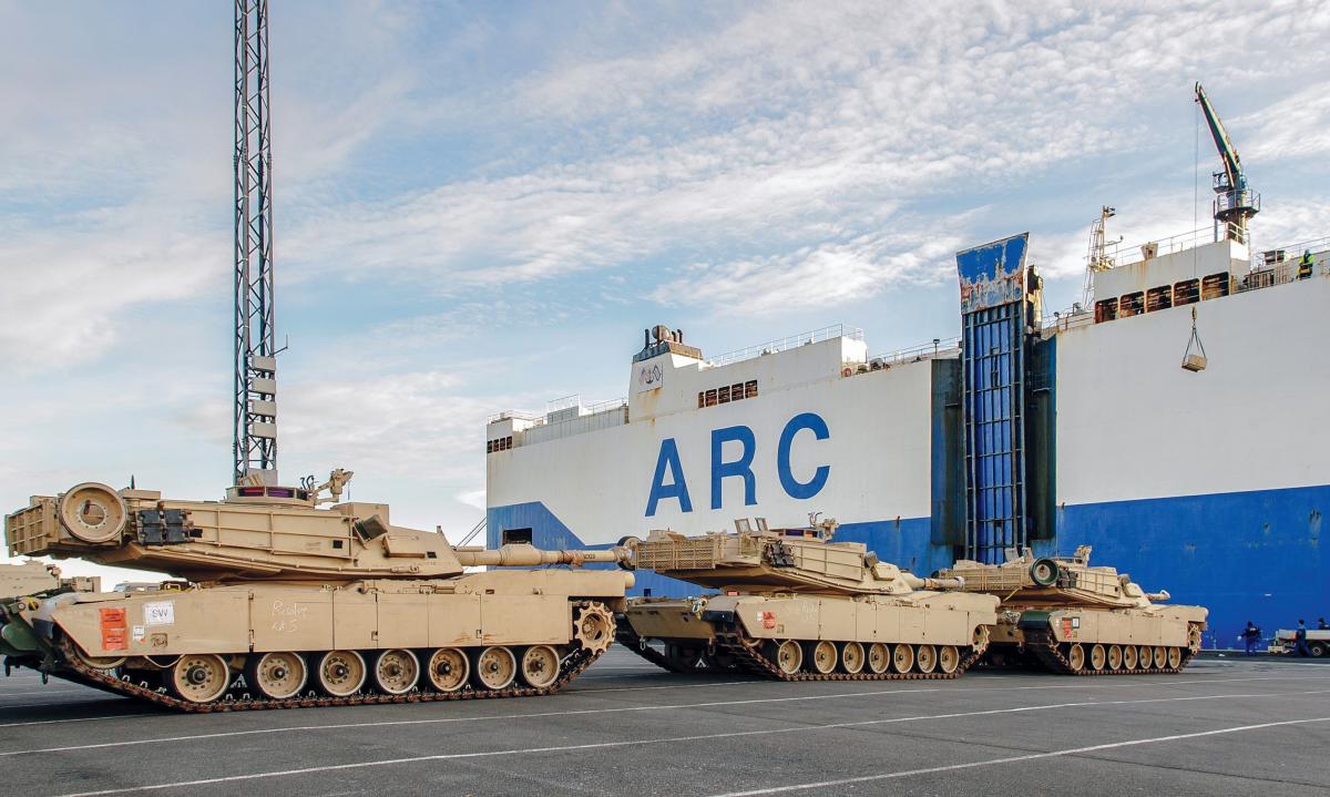 M1A2 Abrams tanks and other military vehicles from 3rd Brigade Combat Team, 4th Infantry Division, are unloaded off the ship ARC Resolve at the port in Bremerhaven, Germany