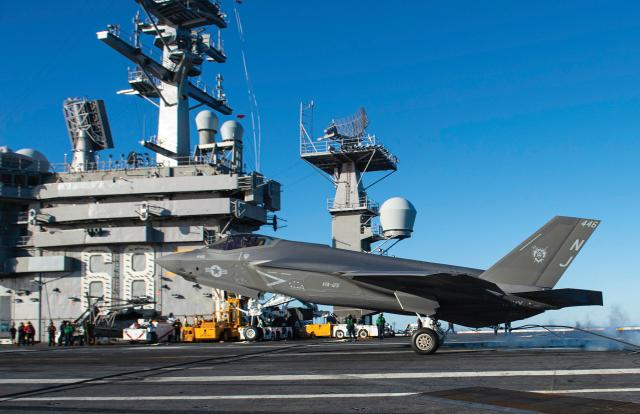 An F-35C makes and arrested landing on the flight deck of the USS Nimitz (CVN-68). The Navy and Marine Corps combined have about 40 F-35s in service, and may have another squadron by 2026.