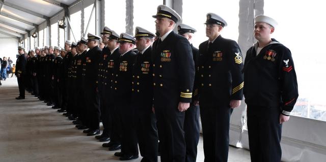 Part of sustaining the submarine force’s edge involves recruiting and retaining the best people. Here, the crew of the USS South Dakota (SSN-790) stand at attention during her commissioning ceremony in 2019. 