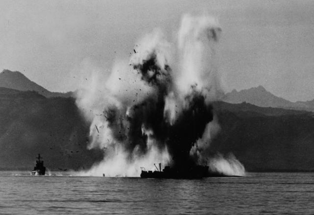 Here, the South Korean minesweeper YMS-512 blows up after detonating a Soviet-made contact mine on 24 October 1950. 