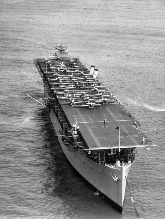 Aerial oblique starboard bow view of the USS Langley (CV-1) at anchor