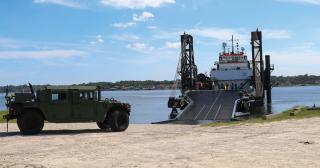 The Marine Corps Warfighting Lab is experimenting with the Stern Landing Vessel to test concepts related to the future Landing Ship Medium.