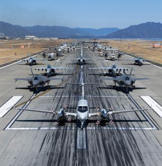 U.S. Marine Corps, U.S. Navy, and Japan Maritime Self-Defense Force aircraft stationed at Marine Corps Air Station Iwakuni take part in an “elephant walk” that included all the squadrons and aircraft types stationed on the base. Dual-use agreements at new Japanese facilities on critical terrain in the first island chain could mitigate U.S. costs but might result in space constraints.
