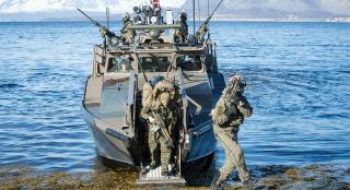 U.S. Marines exit a Norwegian CB90 patrol craft. An unmanned seaplane squadron could operate detachments of eight to ten Marines and six small seaplane UAVs from such a craft (on which the Navy’s former Riverine Command Boat was based).