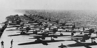Zero Model 21 fighters line the flight deck of the Zuikaku during Indian Ocean operations, April 1942. The Zuikaku would take part in the sinking of HMS Hermes, Dorsetshire, and Cornwall and the air strikes on the Royal Navy bases at Colombo and Trincomalee.  