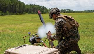 A Marine launches a Switchblade drone