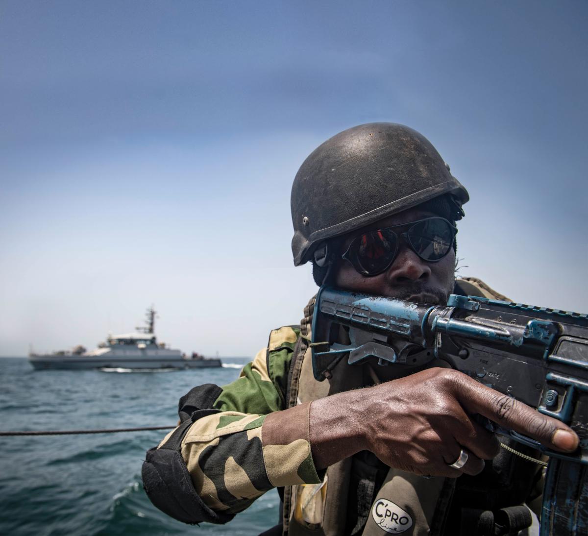 A Senegalese sailor participates in a visit, board, search and seizure training scenario aboard the Gambian navy GNS Kuntah Kinteh during Exercise Obangame Express 2019