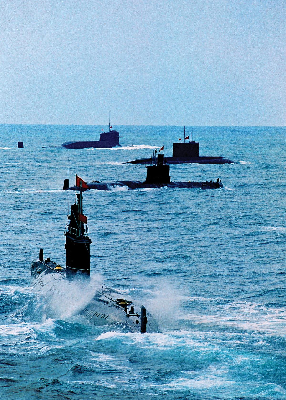 A Chinese navy nuclear submarine takes part in a drill with other submarines in Qingdao in east China's Shandong province. China declassified its first fleet of nuclear submarines for the first time on Sunday, Oct. 27, 2013