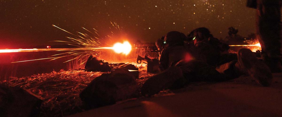 Marines with Marine Rotational Force—Darwin fire an M240B medium machine gun during training with Australian forces in August 2023.