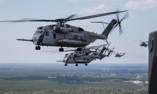 Six U.S. Marine Corps CH-53E Super Stallion helicopters in flight