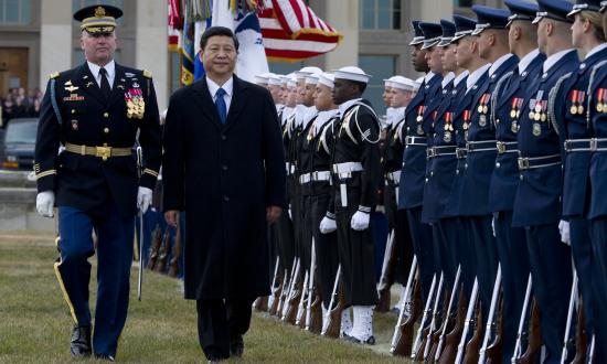 A full honors arrival ceremony welcomes Xi Jinping, center left, to the Pentagon in 2012.