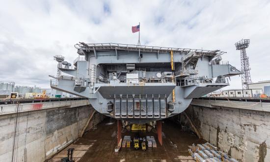  The aircraft carrier USS Nimitz (CVN 68) is seen in Dry Dock 6 after dewatering at Puget Sound Naval Shipyard & Intermediate Maintenance Facility in Bremerton, Wash., March 5, 2018