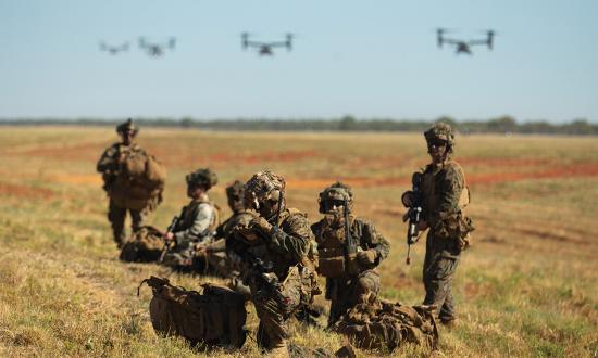 Marines from the 3d Battalion, 7th Marine Regiment, Marine Rotational Force–Darwin 22, observe an MV-22 Osprey land during exercise Southern Jackaroo 22 at Shoalwater Bay Training Area. 