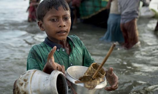 Rohingya refugees arrive in Bangladesh after fleeing Myanmar.