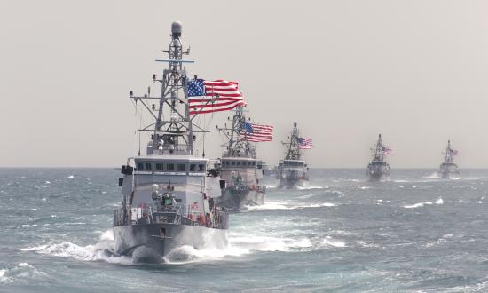 USS Hurricane (PC-3) leading other coastal patrol ships in formation.