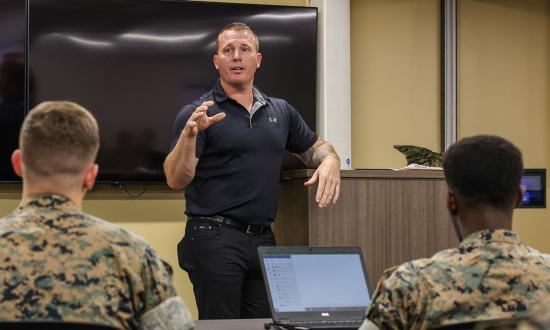 Medal of Honor recipient Dakota Meyer speaks with Corporals Course students from Marine Corps Installations West Communications and Information Systems Division, Marine Corps Base Camp Pendleton, at Camp Pendleton.  