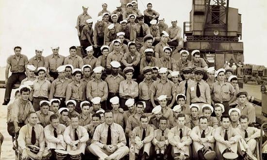 Crew of the USS Seahorse posing on their submarine