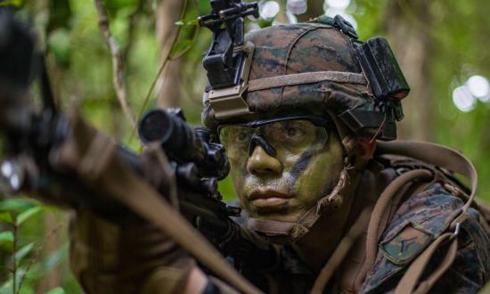 U.S. Marine Corps Pfc. Mario Flores, a rifleman with 2nd Battalion, 7th Marine Regiment, 1st Marine Division, participates in a simulated platoon assault during exercise Valiant Mark 2019, on Tekong Island, Singapore, April 19, 2019