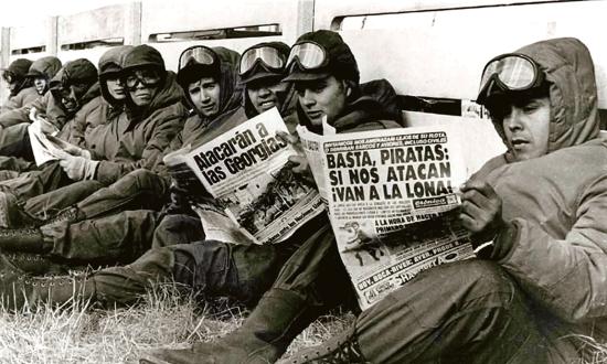 Argentine soldiers reading newspapers in Port Stanley in April 1982