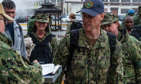 Today, Navy Reserve forces are tightly aligned to critical warfighting functions, to maximize their mandate to provide wartime strategic depth. Here, sailors check in at the hospital ship USNS Comfort (T-AH-20) to support her deployment.