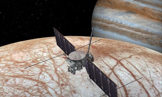 Artist's rendering of the Europa mission spacecraft orbiting the moon with Jupiter in background