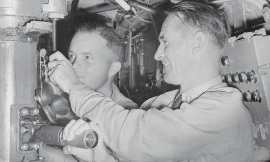 Commander Edward L. Beach (left) on duty on board the USS Amberjack. Beach commanded the Amberjack after a tour in the Navy’s Atomic Defense Section in the Pentagon.