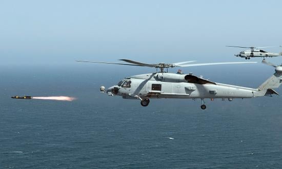 An MH-60R Seahawk assigned to Helicopter Maritime Strike Squadron 71 fires the first of four live AGM-114 Hellfire missiles. Amphibious Ready Group and Marine Expeditionary Unit leaders often do not account for the full warfighting capabilities of Helicopter Sea Combat detachments on board large-deck amphibious ships when planning operations.