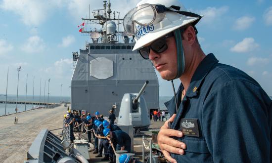 A chief boatswain’s mate observes for safety as sailors handle lines during sea and anchor detail on board the guided-missile cruiser USS Vella Gulf (CG-72). A culture in which sailors choose the safest approach is far more effective than one in which safety is enforced from above.