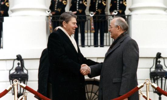 President Ronald Reagan shaking hands with Soviet Premier Mikhail Gorbachev in front of the White House