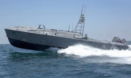 Surface port side profile view of a Common Unmanned Surface Vehicle underway