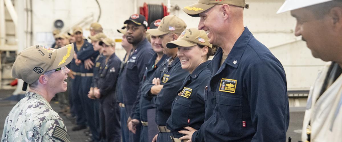Former executive officer Commander Audrey Herrington, left, says farewell to her relief, Commander William Burkland, on board the USS San Diego (LPD-22) in 2023. Public speaking and connecting with your audience is an essential skill for naval leaders.  