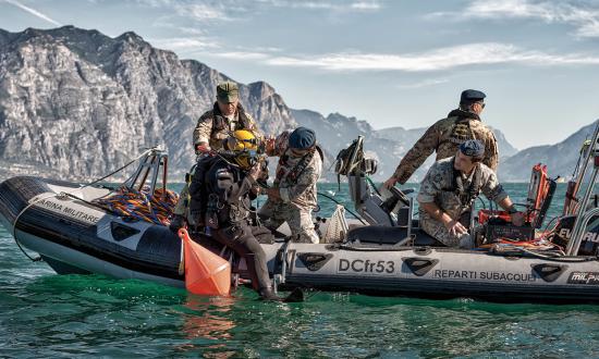 Italian Navy Underwater Operations Group personnel conduct reclamation operations.
