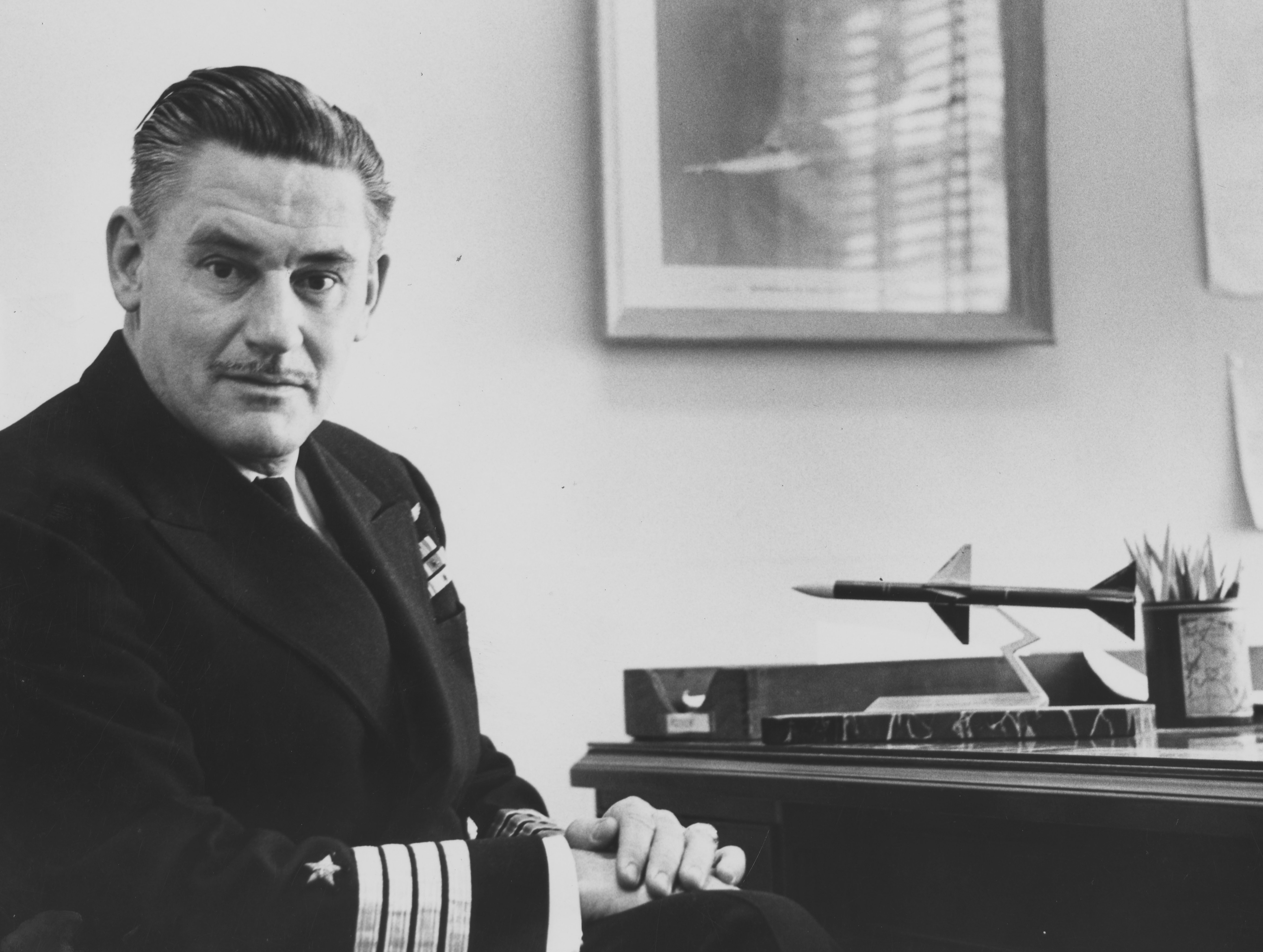 Captain Carl H. Amme, Jr., USN.