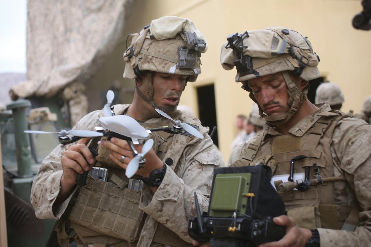Marines perform last minute checks before taking an Instant-Eye unmanned aerial vehicle on patrol in Marine Corps Air Ground Combat Center 29 Palms, Calif. Oct 23, 2016.