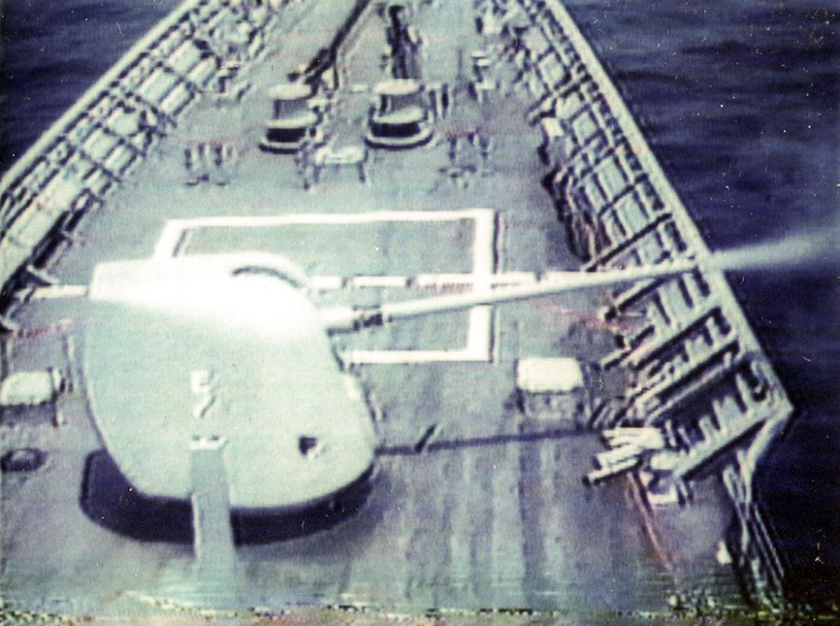 USS Vincennes (CG-49) firing her 5-inch guns at the Iranian patrol boats
