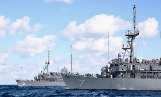 Avenger-class mine countermeasures ships USS Pioneer (MCM-9) and USS Patriot (MCM-7) underway in the Sea of Japan