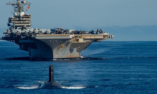 USS Ronald Reagan (CVN-76) and a Los Angeles–class fast-attack submarine