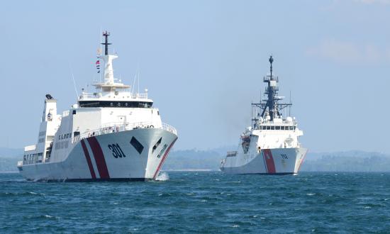 The USCGC Stratton (WMSL-752), shown here transiting the Singapore Strait alongside the Indonesian vessel KN Tan Jun Datu.